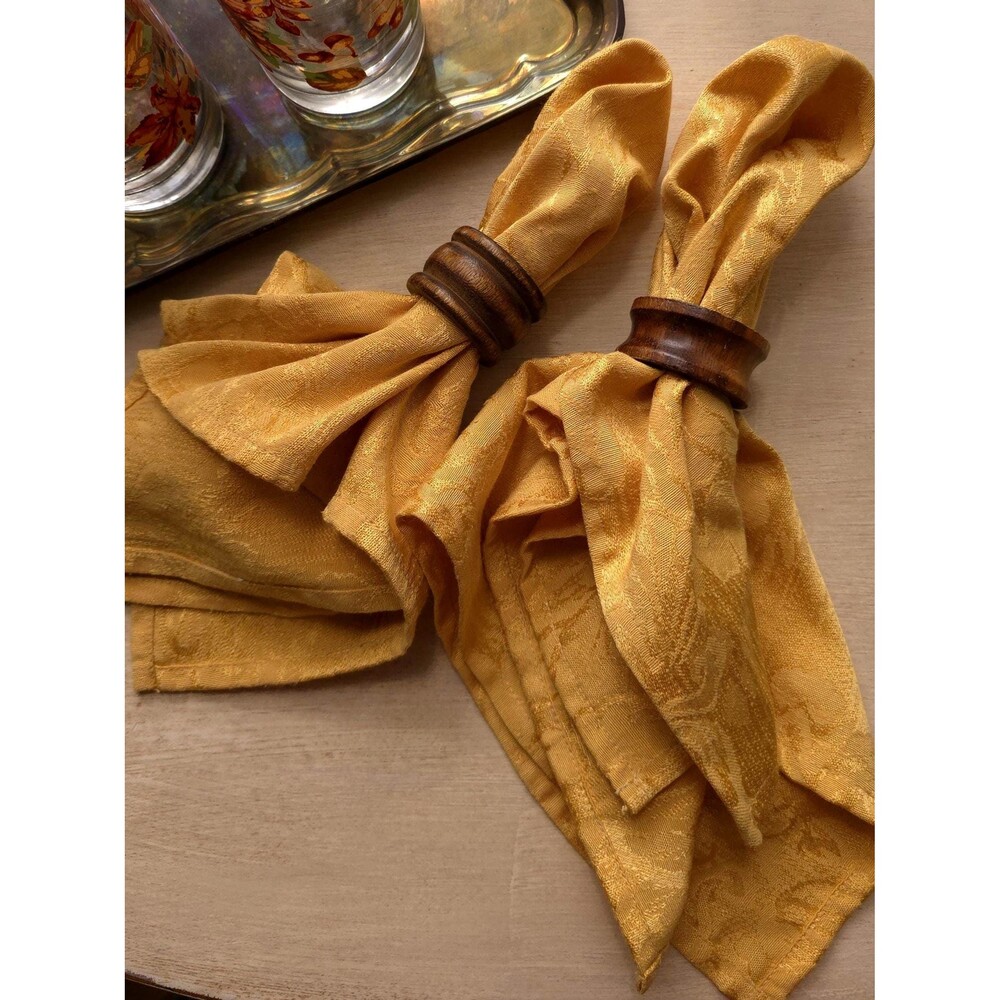 Vintage Yellow Napkins with Unmatched Wooden Holders: Rustic Table Decor